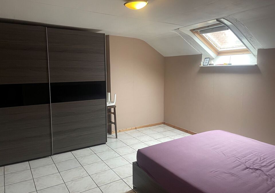 Handelspand met woonst te koop in GENK