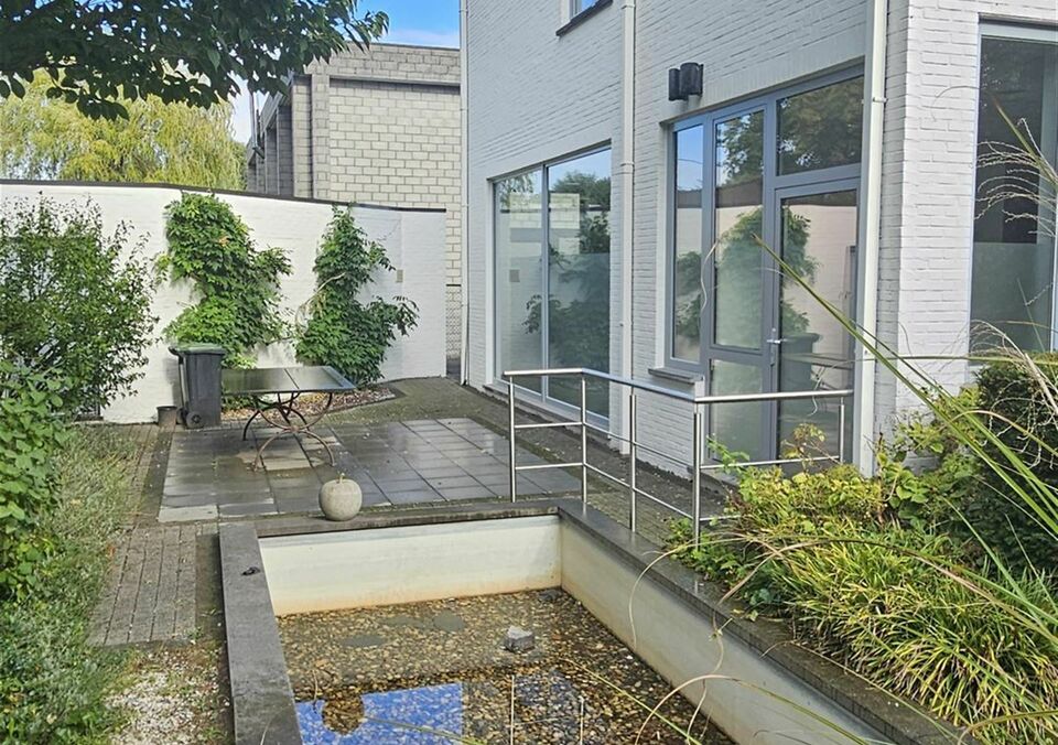 Handelspand met woonst te koop in GENK