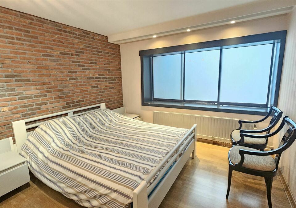 Handelspand met woonst te koop in GENK